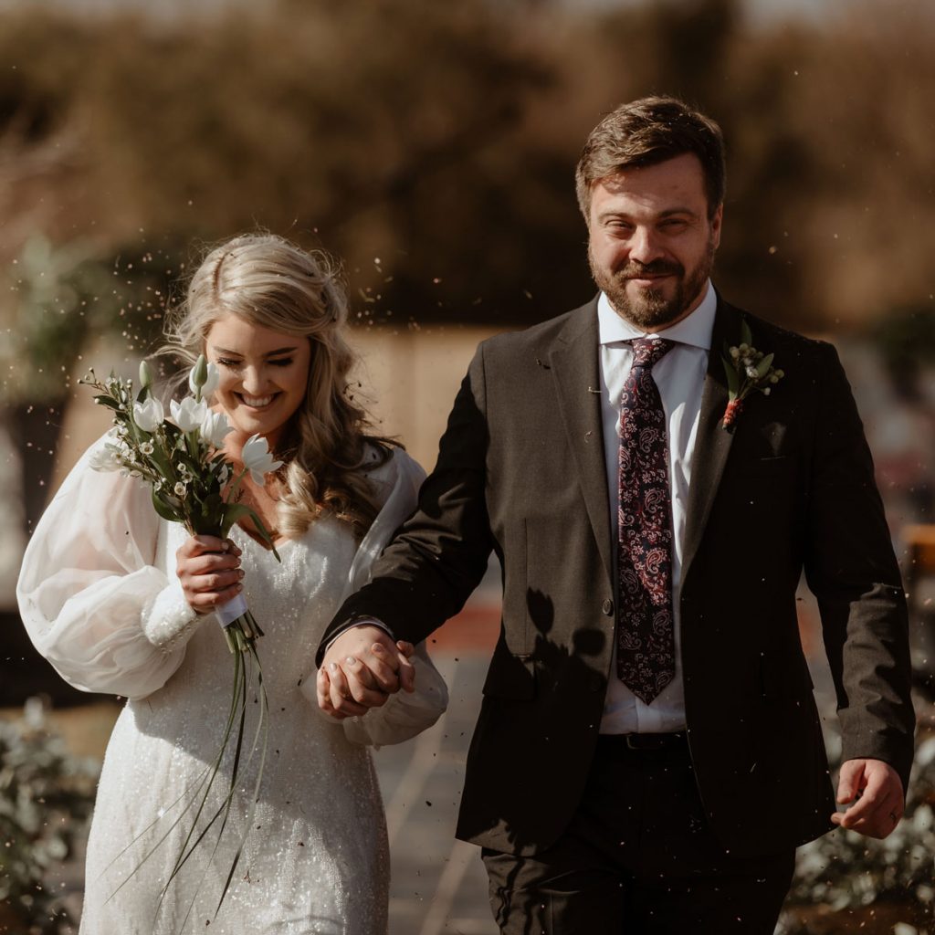 Bridal Couple walk down the aisle at The Nut Farm