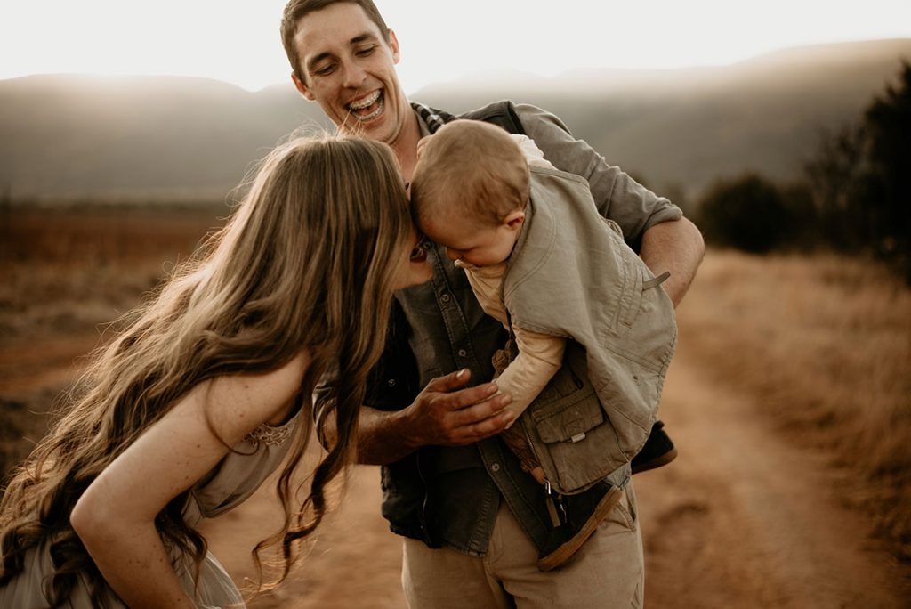 Mother kissing her son at The Nut Farm Venue by Echo Photography
