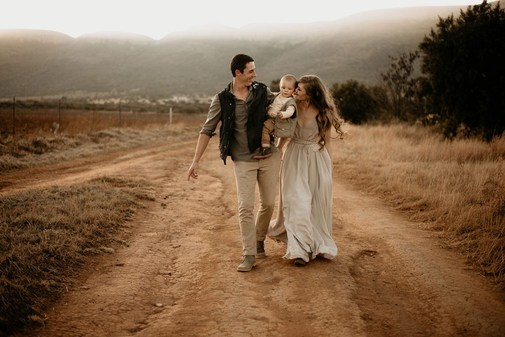 Family on a dirt road at The Nut Farm Venue by Echo Photography
