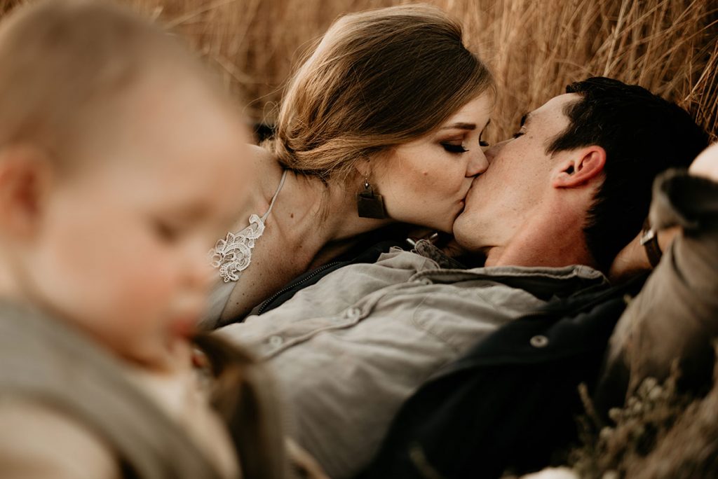 Couple kissing at The Nut Farm Venue by Echo Photography