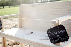 guests sign a bench